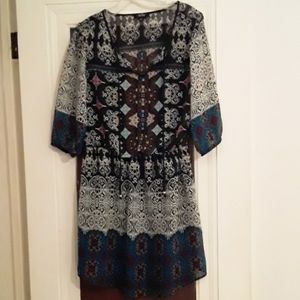 Sheer 3/4 sleeve fully lined mini dress